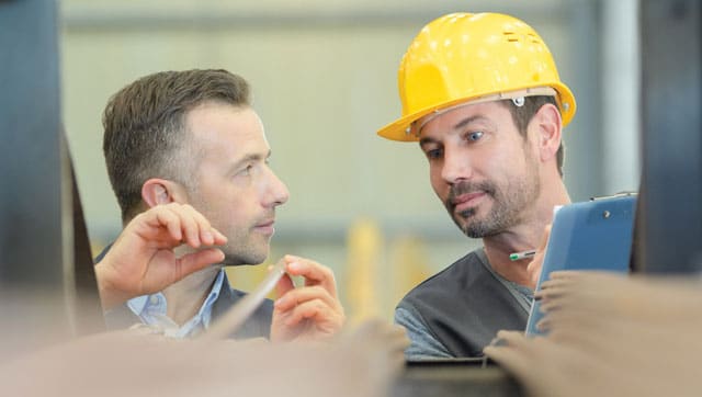 construction workers talking