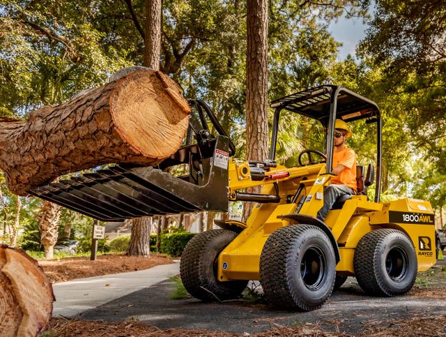 1800AWL Rayco loader holding log