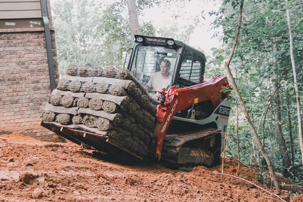 Takeuchi TL12V2 compact track loader with Forks working