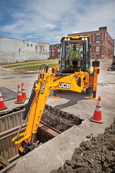 The extendahoe or extradig option has obvious  benefits: greater digging depths and the ability to lift and place items further away from the machine.
